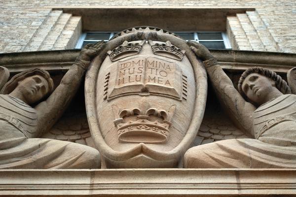 Image taken of Oxford crest on the outside of the Weston Library , image taken looking up at the crest.