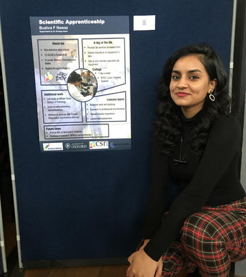 Bushra Nawaz displaying poster at University of Oxford Apprenticeship Awards 2020